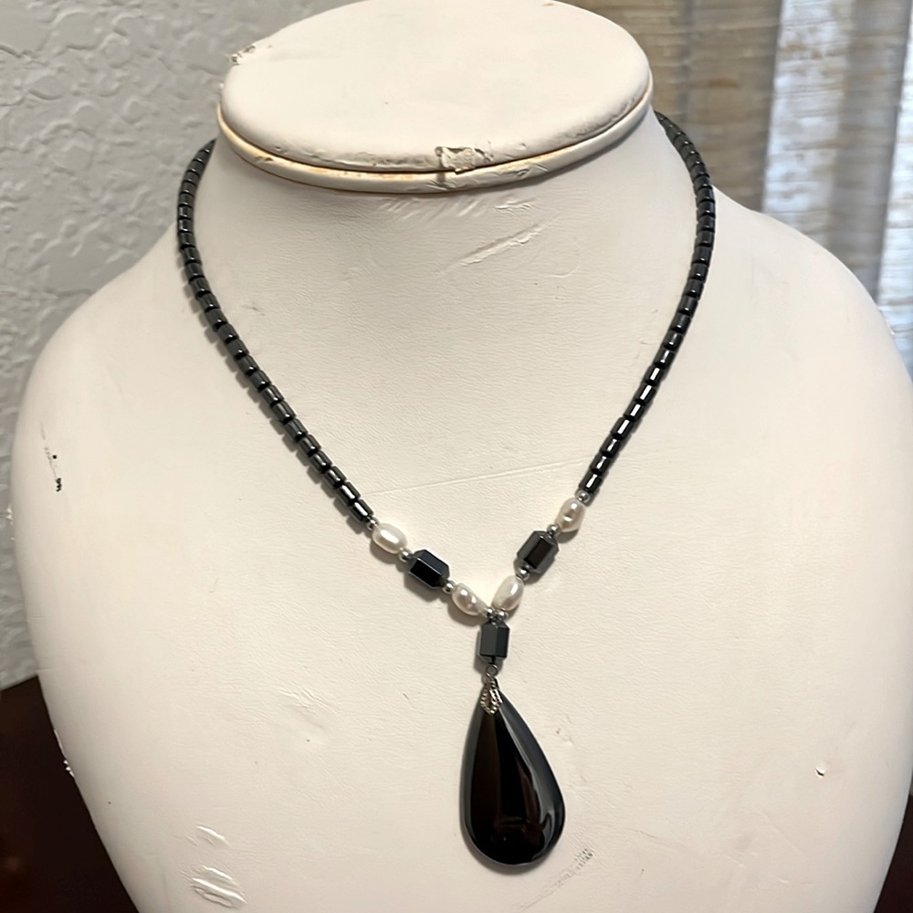 Her mature necklace